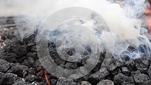 Thick White Smoke from Burning Coal