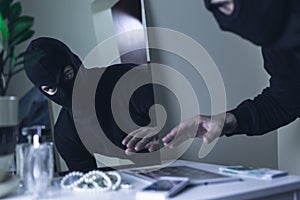 Thief in balaclava photo