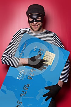 Thief with big blue credit card