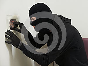 Thief burglar at house code breaking