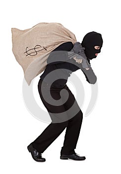 Thief carrying a large bag of money