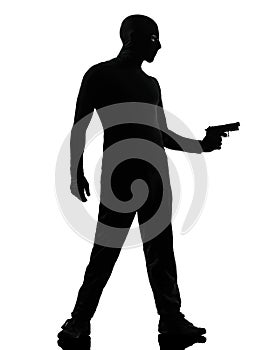 Thief criminal terrorist aiming gun man