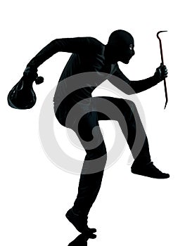 Thief criminal terrorist aiming gun man photo