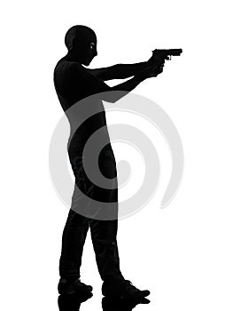 Thief criminal terrorist aiming gun man silhouette