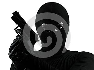 Thief criminal terrorist holding gun portrait