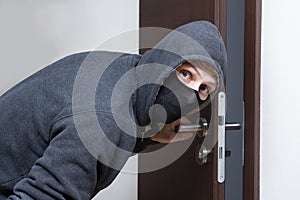 Thief opening door