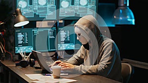 IT thief programmer with mask hacking database servers