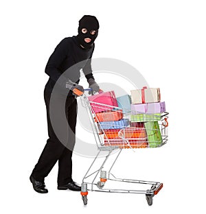 Thief pushing a trolley of gifts