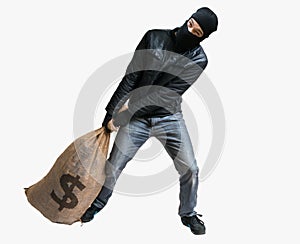 Thief or robber is pulling loot - heavy bag full of money. Isola