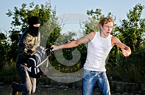 Thief stealing a backpack