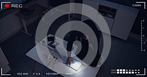 Thief Stealing Computer From Office
