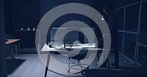 Thief Stealing Computer From Office