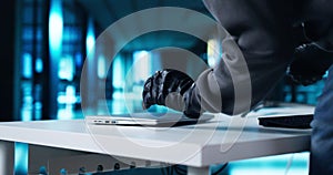 Thief Stealing Laptop Computer From Office