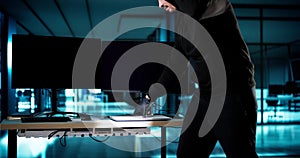 Thief Stealing Laptop Computer From Office