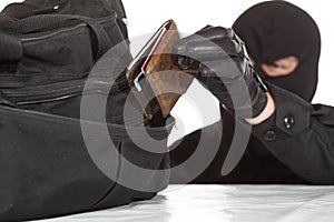 Thief stealing a wallet