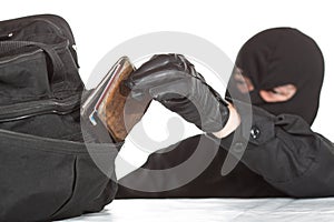 Thief stealing a wallet