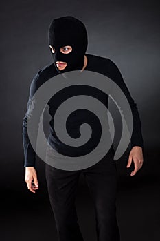 Thief wearing a balaclava