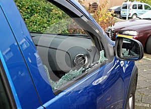 Thiefs have broken a car window to steel items