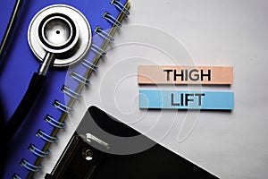 Thigh lift text on top view  on white background. Healthcare/medical concept