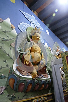 Guardian Lord deity sculpture on entrance to the Trassichoe Dzong