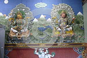 Guardian Lord deity sculpture on entrance to the Trassichoe Dzong