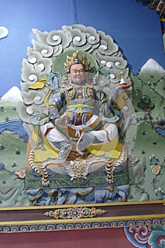 Guardian Lord deity sculpture on entrance to the Trassichoe Dzong