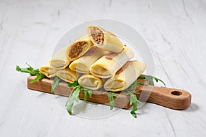 Thin crepe stuffed with chicken giblets