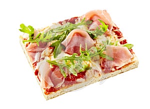 Thin crust arugula and ham Italian pizza