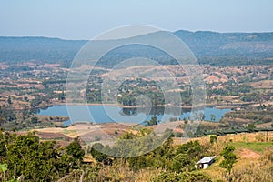 Thin fog,hills cascading beautifully and Rattanai reservoir as seen from the Viewpoint opposite to district office of Khao Kho,Ph