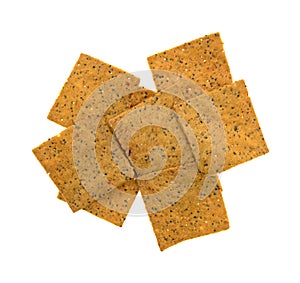 Thin gourmet snack crackers on a white background