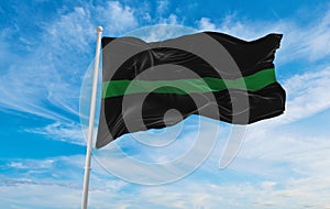 Thin Green Line flag waving, panoramic view, Wildlife Officers, Park Rangers, Federal Agents, Border Patrol, Military Personnel