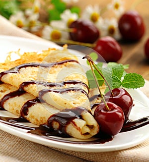 Thin pancake with chocolate syrup