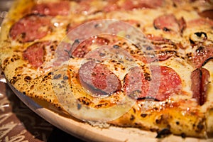 Thin peperoni pizza closeup