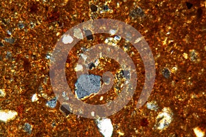 Thin section of a brick under the microscope
