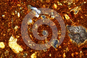 Thin section of a brick under the microscope