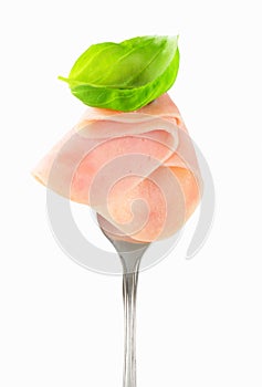 Slice of ham on fork