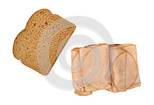 Thin sliced smoked turkey sandwich on a white background