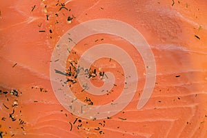 Thin slices of marinated and smoked salmon