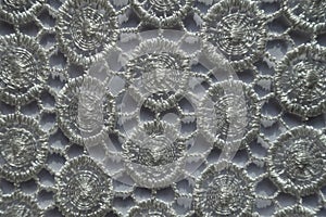 Thin white lacy fabric from above