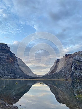 Thinice mountains and there is a lake in the middle