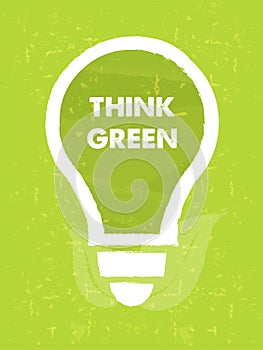 Think green in bulb symbol with leaf sign over green grunge back