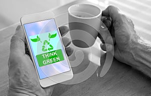 Think green concept on a smartphone