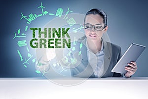 Think green ecological concept with businesswoman