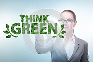 Think green ecological concept with businesswoman