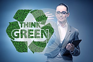 Think green ecological concept with businesswoman