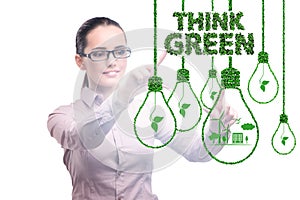 Think green ecological concept with businesswoman