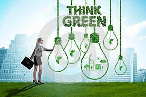 Think green ecological concept with businesswoman