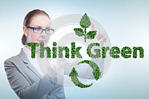 Think green ecological concept with businesswoman