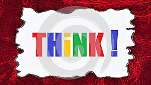 Think! The inscription on the sheet in letters of different colors.
