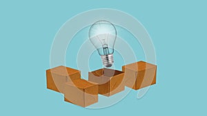 Think outside of the box and idea concept. Glowing light bulb over open cardboard box